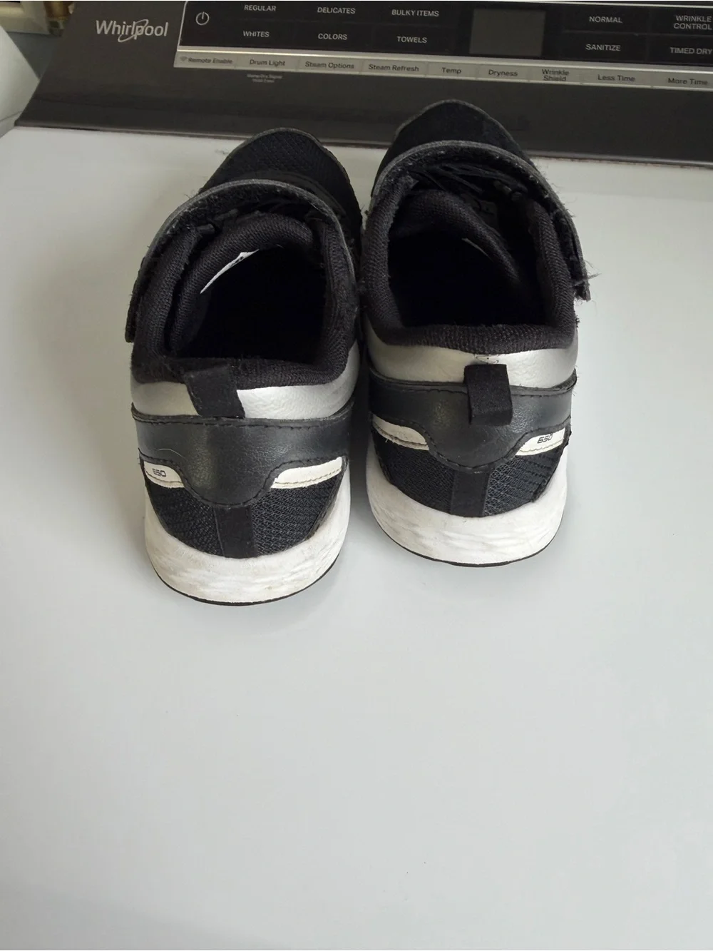 New Balance Kids Black and White Sneakers